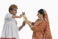 Couple performing Dandiya Raas on Navratri