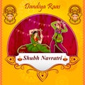 Couple performing Garba dance in Dandiya Raas for Dussehra or Navratri