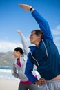 Couple performing stretching exercise Royalty Free Stock Photo
