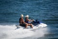 Couple on personal water craft on Colorado River