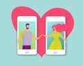 A couple on the phone display holds each other s hands on the background of a heart symbol. The concept of internet dating, love