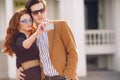 The couple is photographed with smartphone in the city Royalty Free Stock Photo