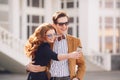 The couple is photographed with smartphone in the city Royalty Free Stock Photo