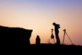 Couple photographer silhouette over Phu chee Fha mountain background ,Chiangrai ,Thailand Royalty Free Stock Photo