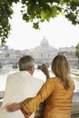 Couple Photographing Cathedral In Rome