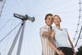 Couple Photographing Themselves Against London Eye