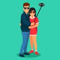 Couple photographing themselves on selfie stick