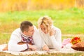 Couple on a picnic together reading novel Royalty Free Stock Photo