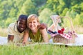 Couple picnicking in park