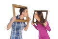 Couple with picture frames. Royalty Free Stock Photo