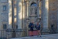 Couple of pilgrims in front of the facade of San Francisco convent