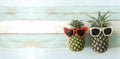 Couple pineapple on wooden background