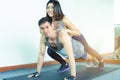 A couple is planking in fitness center Royalty Free Stock Photo