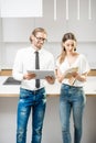 Couple planning home interior in the kitchen Royalty Free Stock Photo