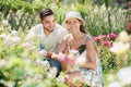 Couple planting garden plants Royalty Free Stock Photo