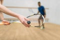 Couple play squash game in indoor training club Royalty Free Stock Photo