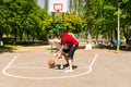 Couple Playing Basketball on Outdoor Court Royalty Free Stock Photo