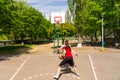 Couple Playing Basketball on Outdoor Court Royalty Free Stock Photo