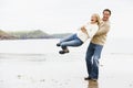 Couple playing on beach