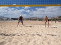 Couple is playing beachvolleyball Royalty Free Stock Photo