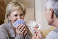 Couple Playing Cards At Home Royalty Free Stock Photo