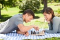 Couple playing chess in the park Royalty Free Stock Photo