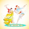 Couple playing Dandiya