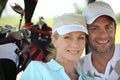 Couple playing golf Royalty Free Stock Photo