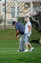 Couple playing golf, Caleta de Velez.