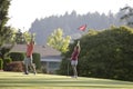 Couple Playing Golf - Horizontal Royalty Free Stock Photo