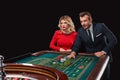 Couple playing roulette wins at the casino. Royalty Free Stock Photo