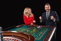 Couple playing roulette wins at the casino. Royalty Free Stock Photo