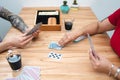 Couple playing rummy with cards at home. Close up caption Royalty Free Stock Photo