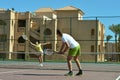 Couple playing tennis Royalty Free Stock Photo