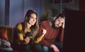 Couple playing video games at home Royalty Free Stock Photo