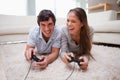 Couple playing video games together Royalty Free Stock Photo