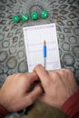 The Couple playing Yahtzee game in free time, outdor Royalty Free Stock Photo