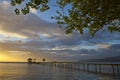 Couple on pontoon at sunset Royalty Free Stock Photo