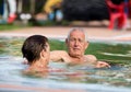 Couple in the pool Royalty Free Stock Photo