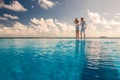 Couple at the poolside Royalty Free Stock Photo