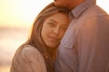 Couple, portrait and hug for love at beach, ocean waves and peace for romance in relationship. Happy woman, care and Royalty Free Stock Photo