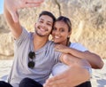 Couple, portrait smile and selfie on the beach for happy free bonding or relaxing time together in the outdoors. Man and Royalty Free Stock Photo