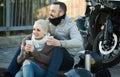 Couple posing near motor bike with sandwitches and coffee Royalty Free Stock Photo