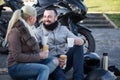 Couple posing near motor bike Royalty Free Stock Photo