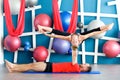 Couple practicing acro yoga in a studio. Acro yoga concept