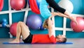 Couple practicing acro yoga in a studio. Acro yoga concept. Couple yoga class