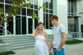 Couple With Pregnant Wife walking in a city street Royalty Free Stock Photo