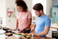 Couple Preparing Batch Of Healthy Meals At Home In Kitchen Together Royalty Free Stock Photo