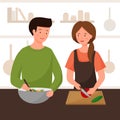 A couple is preparing dinner in the kitchen. A man and a woman are preparing food together. The family makes a vegetable Royalty Free Stock Photo