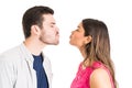 Couple Puckering Lips While Standing Face To Face